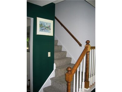 Foyer. The entrance way has hardwood floors and ne