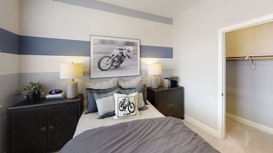 Two secondary bedrooms found upstairs each feature walk-in closets.