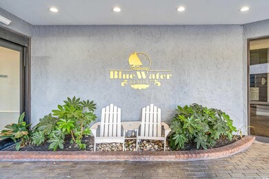 Property entrance with stucco siding