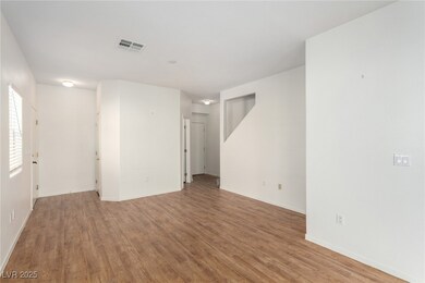 Unfurnished room featuring light wood-style floori