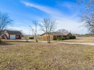 Shop in back has front & rear garage entry doors.