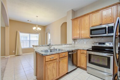 15910 Cottage Ivy Cir, Tomball, TX 77377 - photo 6