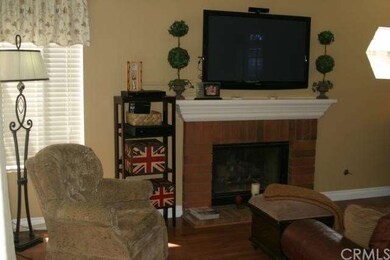 FAMILY ROOM WITH GAS FIREPLACE, OPEN TO KITCHEN 