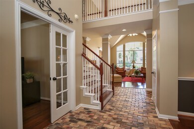 Come in and take a look around!  The brick paver flooring extends from the front foyer through the kitchen and breakfast room and hallway to the master.