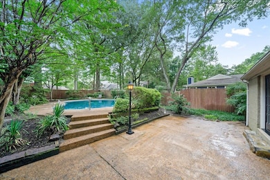 View of pool featuring a patio and a fenced backyard