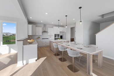 Photo of actual home - Kitchen with extended island