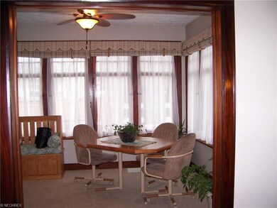 Sunroom off the living room and kitchen area. Lots