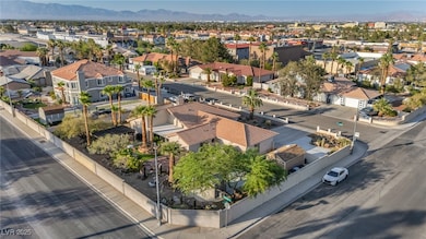 Aerial view of residential area featuring a mounta