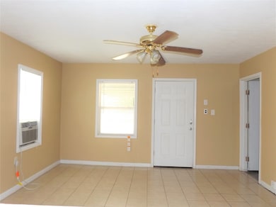 Living area with window unit for air/heat