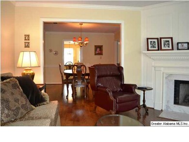 Beautiful living room opens to the formal dining r