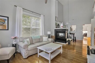 Vaulted family room with 2-sided fireplace