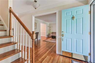 Center Entrance Foyer Opens to Living, Family and 