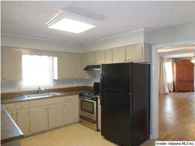 NEW STAINLESS STEEL APPLIANCES AND BLACK REFRIGERA