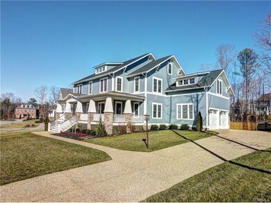 Welcoming front porch is 8' deep across the front,