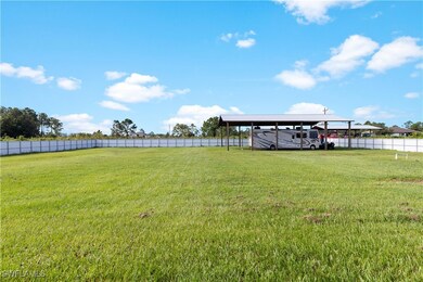 Completely Fenced-in back yard with Pole Barn
