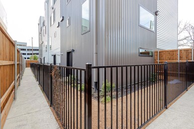 View of property exterior with fence