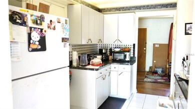 Looking in kitchen from breakfast nook.