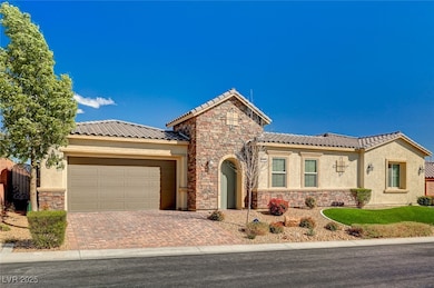 Mediterranean / spanish-style house featuring a ti