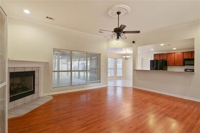Family Room with fireplace, breakfast bar and open