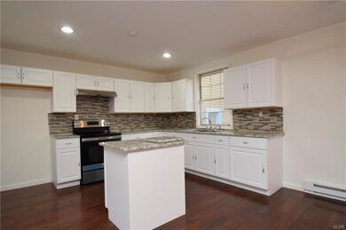 524 - New kitchen/granite/backsplach/recess lighti