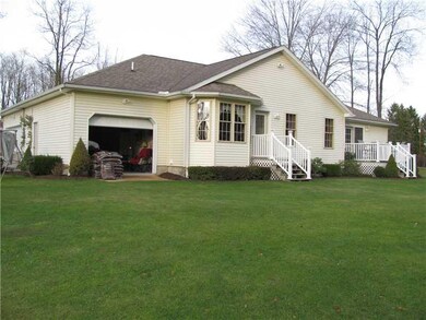 Exterior Back. 3rd GARAGE DOOR TO THE REAR OF THE 