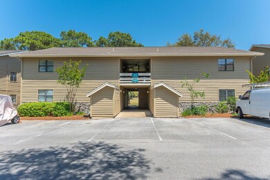 1-web-or-mls-Golf Villas Unit 8E Exterio