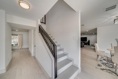 Stairwell masterfully redone, breakfast nook just 