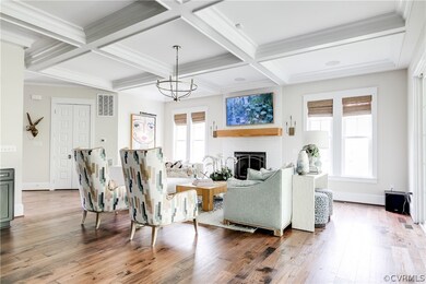 Alternate view of the family room with a coffered
