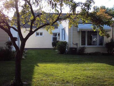 Exterior Back. Lovely yard --shows family room add