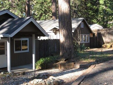 Front of main house with guest house behind.