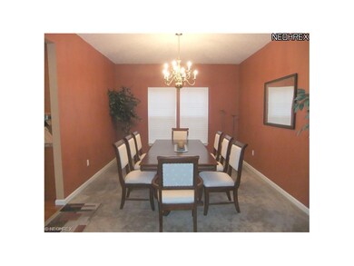 The flow continues into the home??s formal dining 