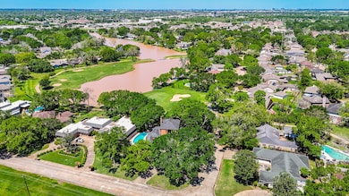 Great overhead view of the gorgeous wooded lot wit