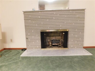 This striking fireplace is the focal point in this