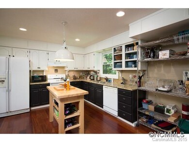 spacious kitchen with granite