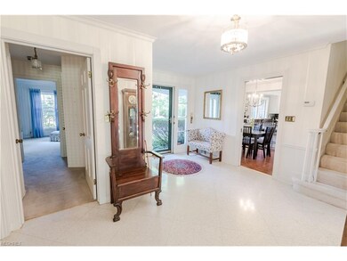 The light filled entrance hall with white detailin