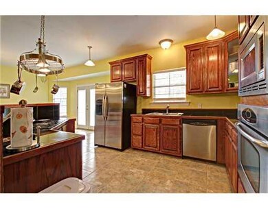 Photo. GOURMET KITCHEN BOASTS ALL STAINLESS, CUSTO