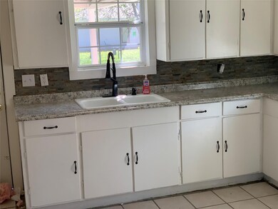 309 Avenue A, Ennis, TX 75119 - photo 6