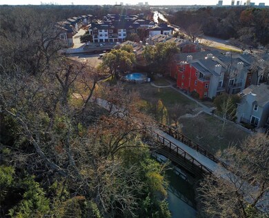 Drone view of back of building from above the cree