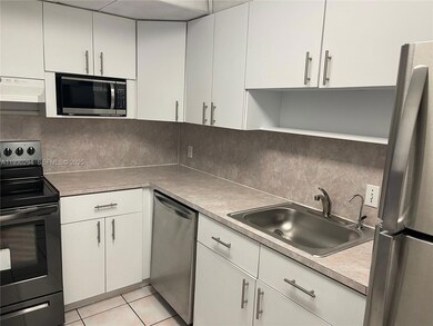 4848 NW 24th Ct unit 318, Lauderdale Lakes, FL 33313 - photo 3