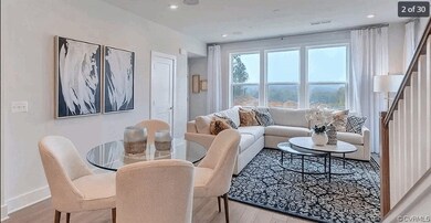 Living room with light hardwood / wood-style flooring