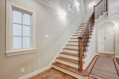 Light filled entry with gleaming hardwoods!  There