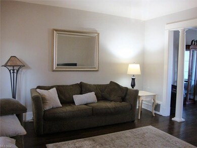 Living room features hardwood flooring