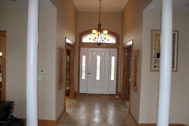 Foyer with tile floor