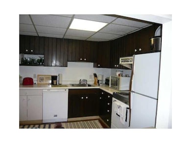 Kitchen. The kitchen is large enough for casual di