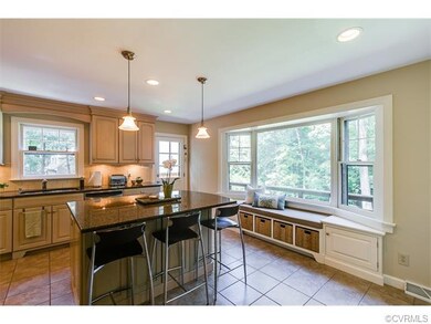 Kitchen with picture window and custom seating
