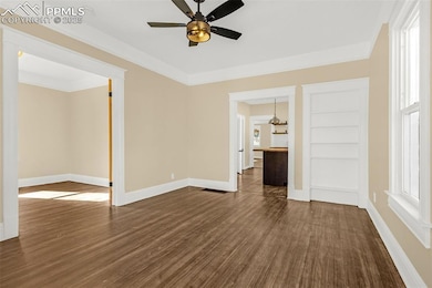 Versatile Formal Living or Dining Area with Original Hardwood floors and Built-in