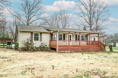Ranch-style house with a wooden deck
