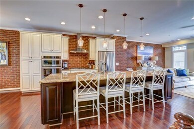 Open concept main living area with large granite i