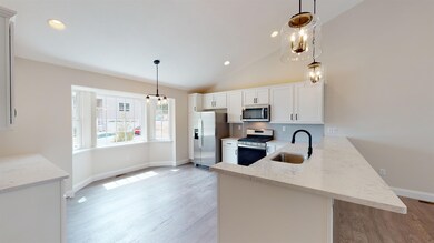 SIMILAR UNIT KITCHEN VIEW WITH BAY WINDOW