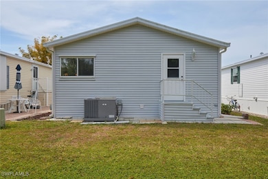 Back of house with room for a patio area, central